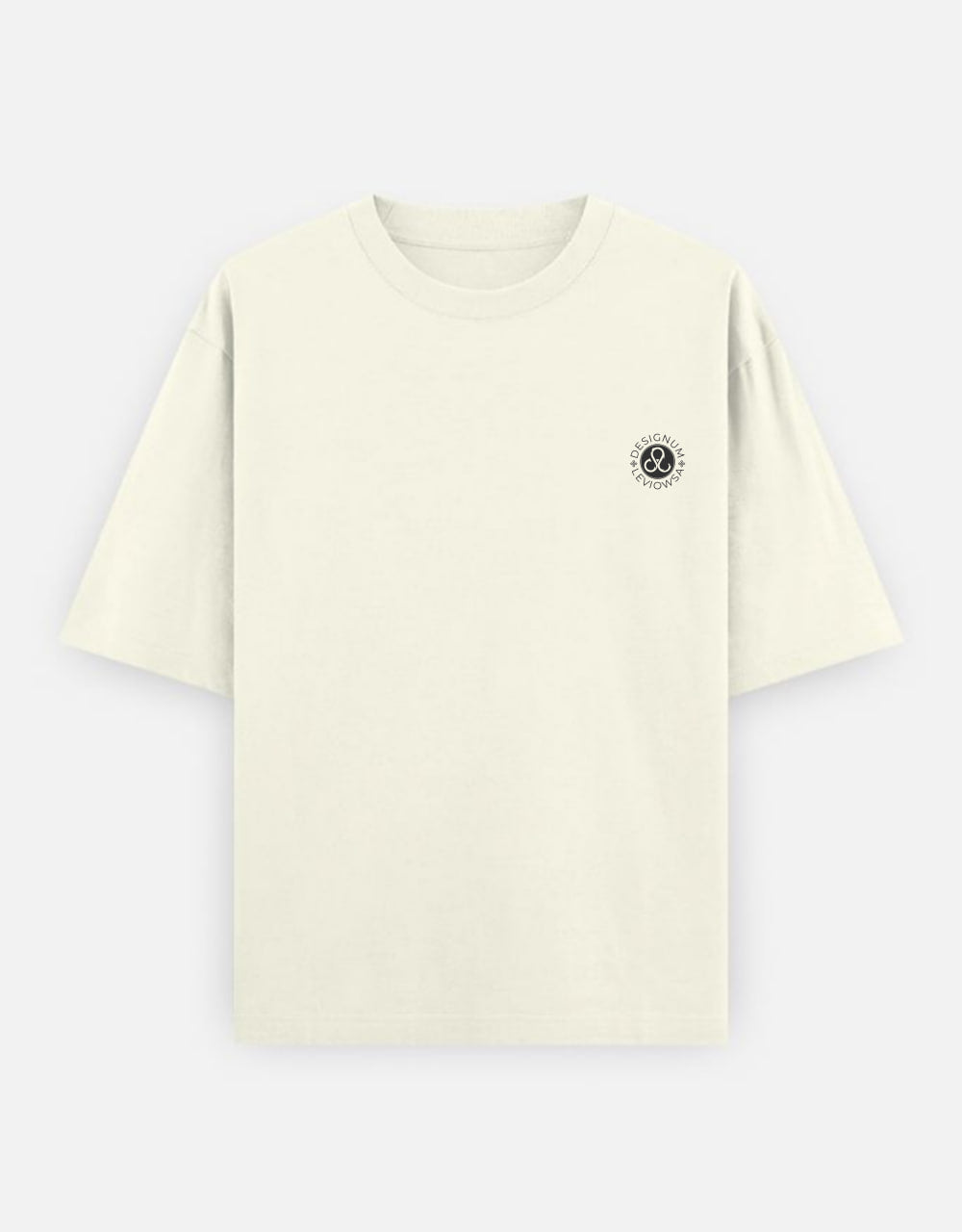 An off-white short-sleeve t-shirt with a large black circular graphic on the back, featuring a tree of wish - The KalpVriksh, and the text 'Manifest Abundance | The KalpVriksh'.