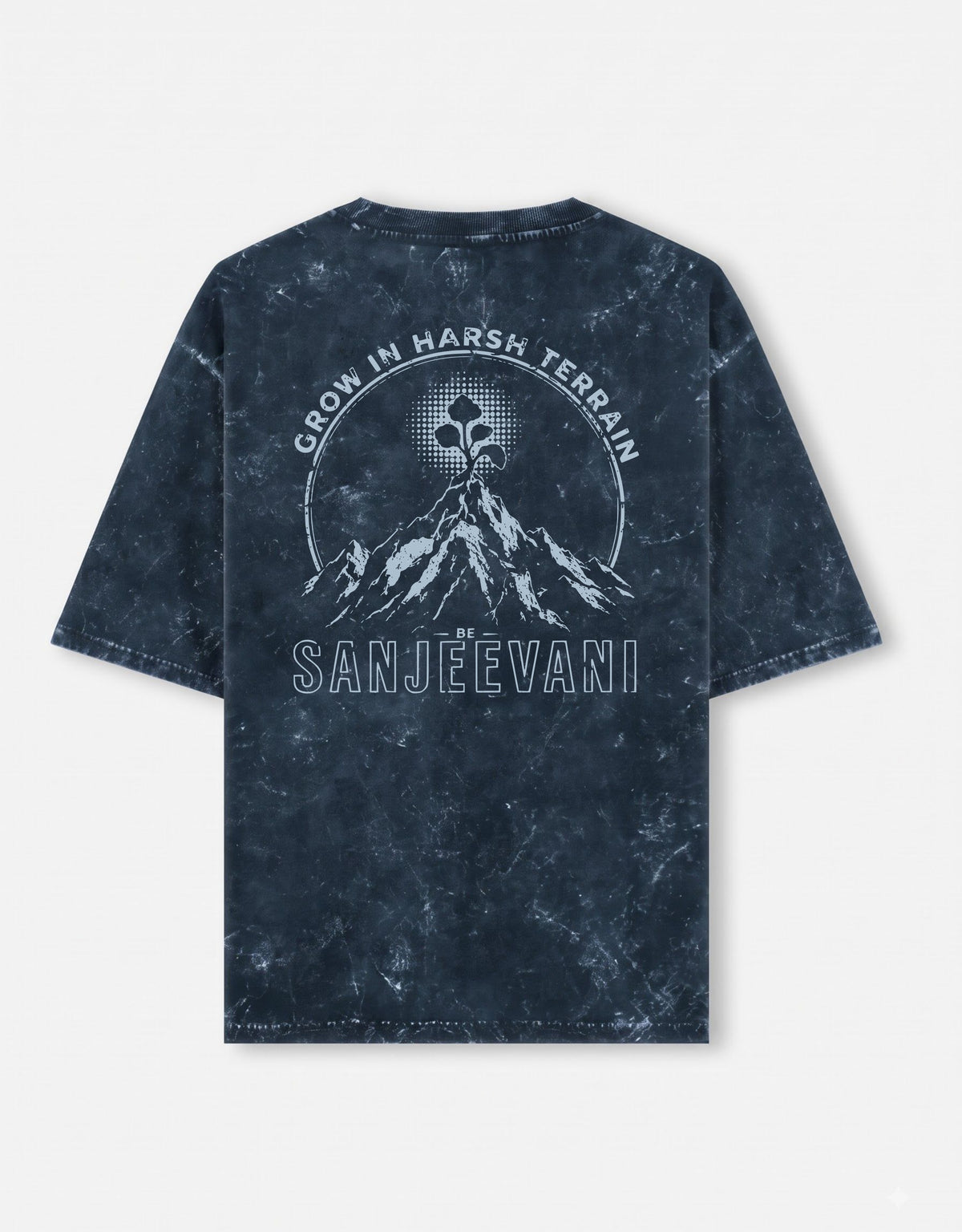 A dark navy blue short-sleeve acid wash t-shirt with a texture and a graphic of an ethereal flower on a mountain is printed in ice blue colour showing and saying 'SANJEEVANI'
